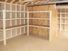 14x24 Custom Peak Storage Shed with Shelves and Loft Inside